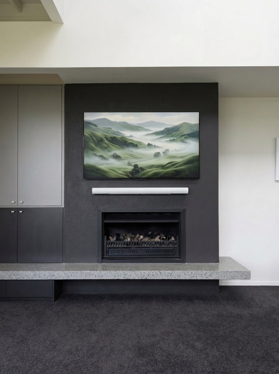 Fireside lounge home theatre wall with Samsung 65-inch S95D QD-OLED 4K UHD TV, white Sonos Arc soundbar, and built-in gas fireplace